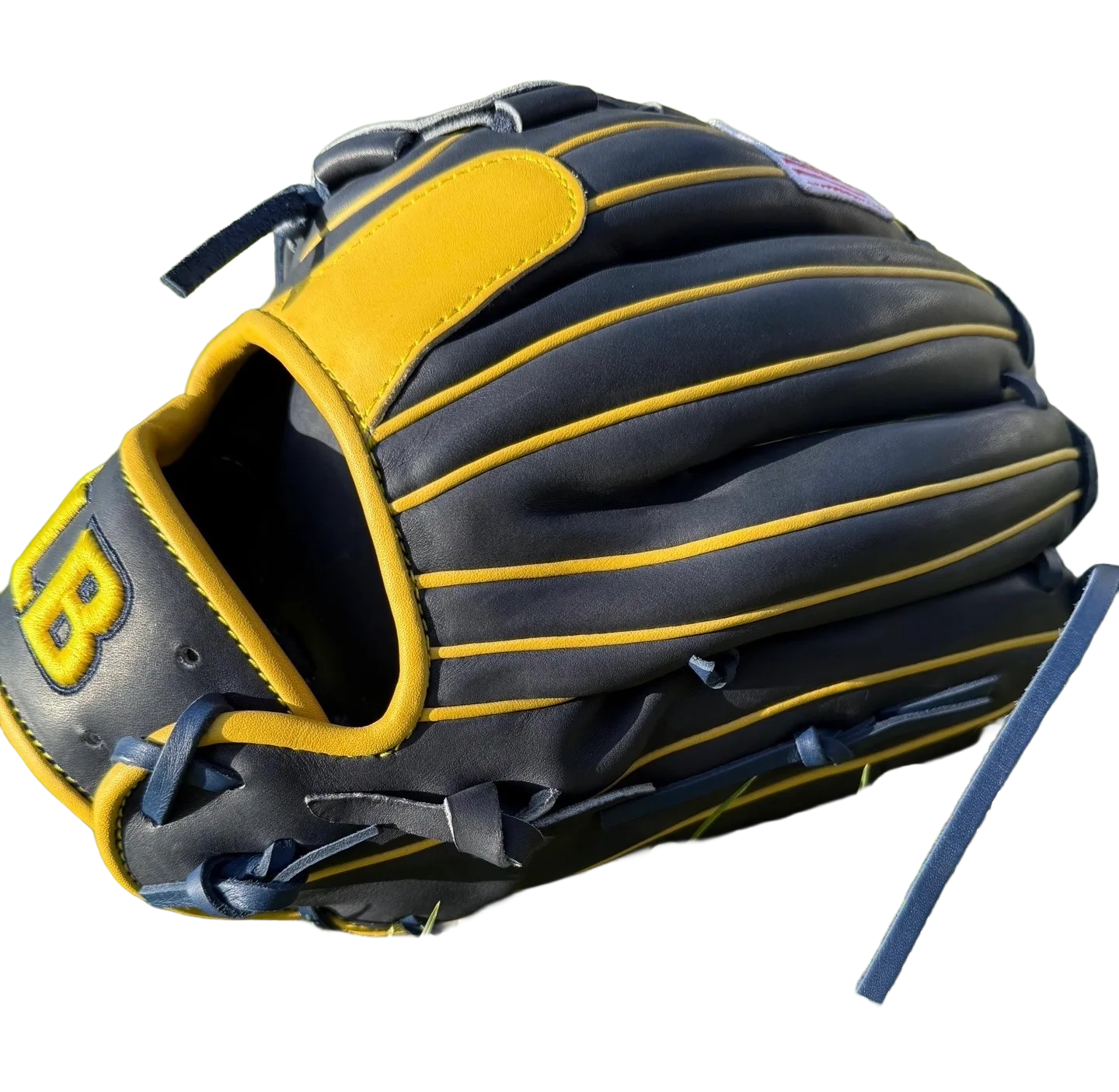 Bush League Baseball custom glove in navy leather with gold welting and BLB patch